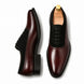 Burgundy leather and black suede Oxford, three-quarter angle showing heel and two-tone detailing