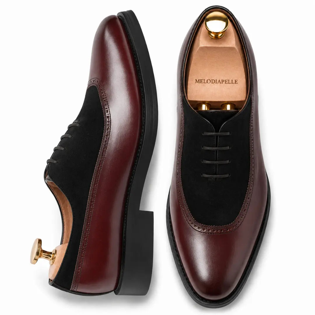 Burgundy leather and black suede Oxford, three-quarter angle showing heel and two-tone detailing