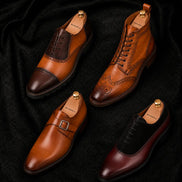Melodiapelle Bellagio Oxford collection showing burgundy and black suede leather pairs, handcrafted lace-up Oxford shoes displayed together