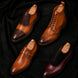 Melodiapelle Bellagio Oxford collection showing burgundy and black suede leather pairs, handcrafted lace-up Oxford shoes displayed together