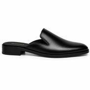 Side profile of the Farida Mule in black leather on white background