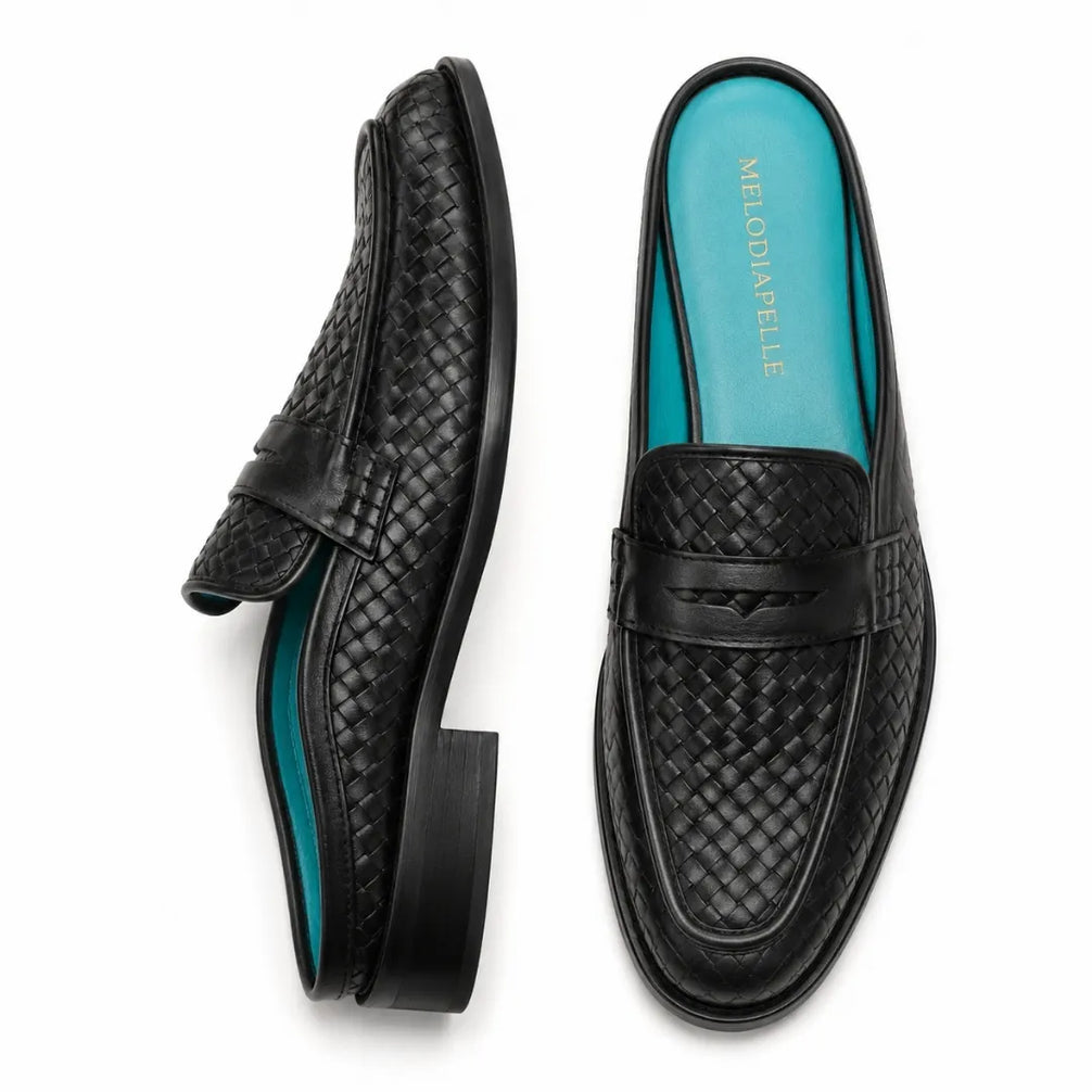 Black woven leather penny mule, three-quarter angle showing heel and woven texture