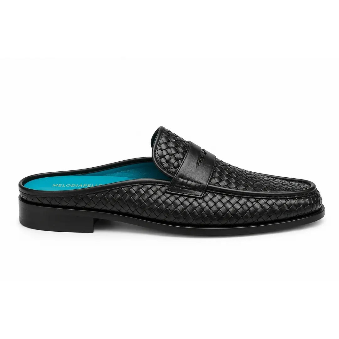 Side profile of the Madana Mule in black woven leather on white background