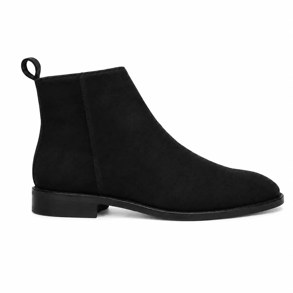 Side profile of the Maddox Suede Zip Boot in nero black suede on white background