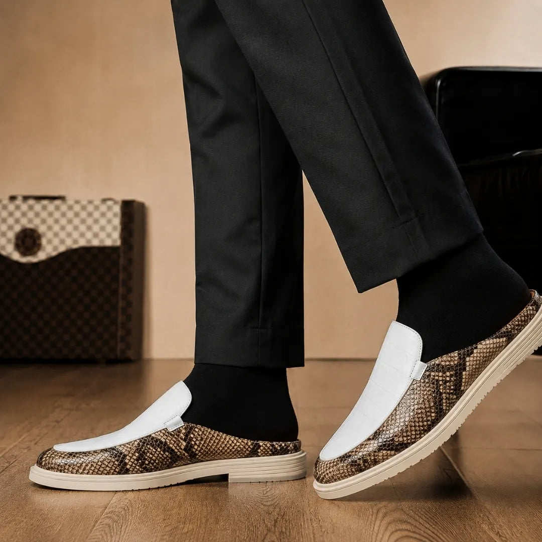 Melodiapelle Madise Mule in white and snake-print brown leather worn with trousers, on-feet shot