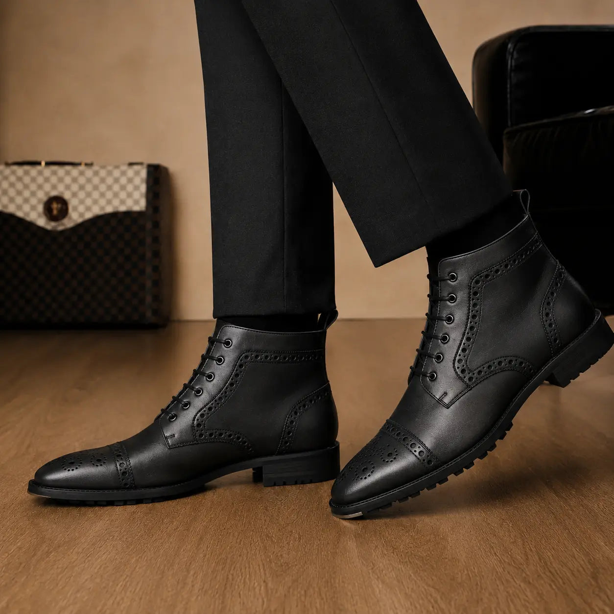 Melodiapelle Madison Combat Boot in black leather worn with trousers, on-feet shot