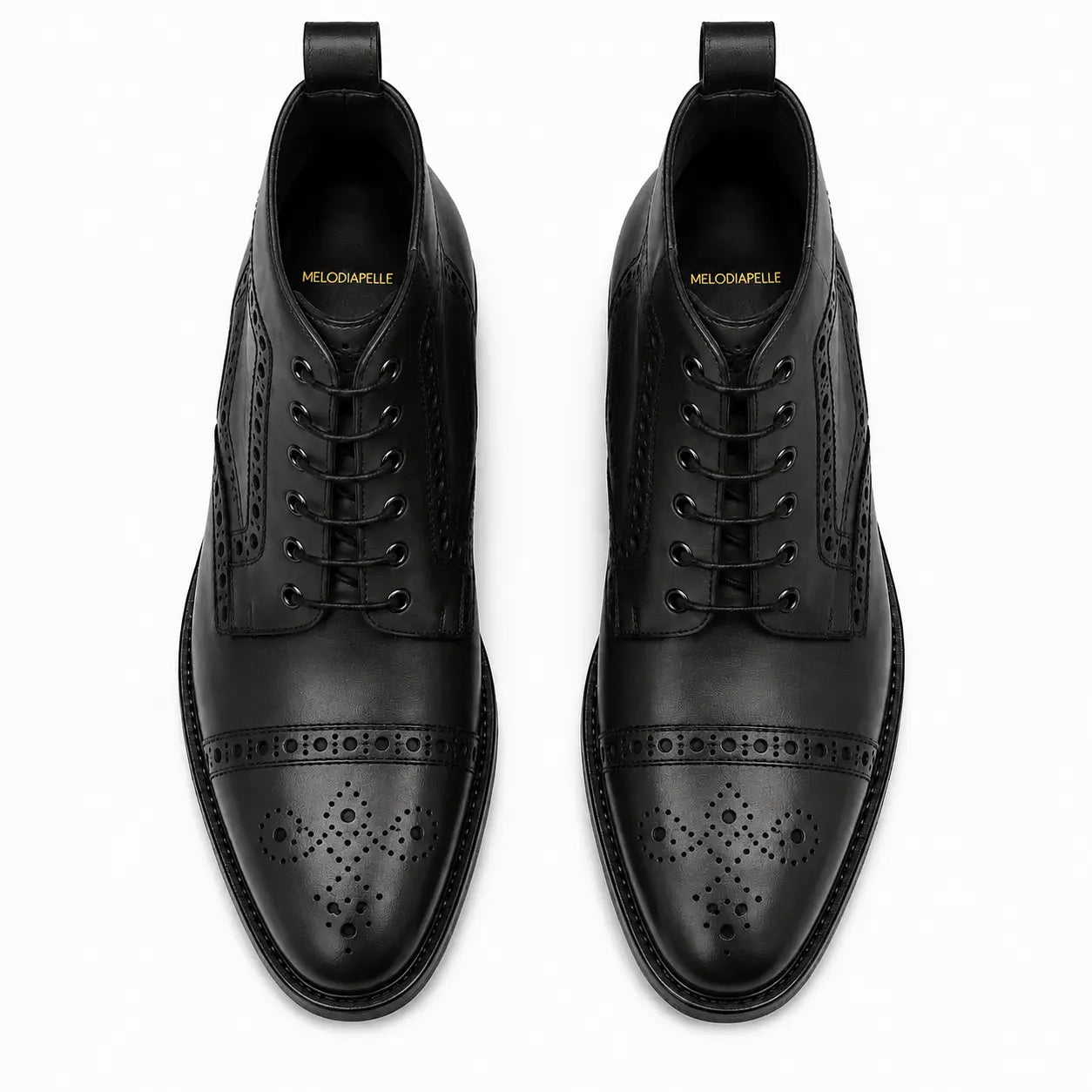 Melodiapelle Madison Combat Boot in black leather, pair top-down view, handcrafted in Agra