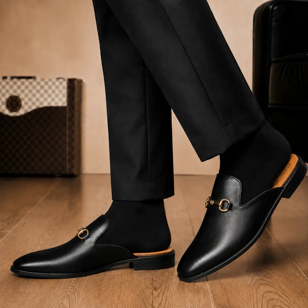 Melodiapelle Madison Mule in black leather worn with formal trousers, on-feet shot