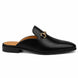 Side profile of the Madison Mule in black leather on white background