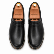 Melodiapelle Madison Mule in black leather, pair top-down view, handcrafted in Agra