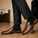 Melodiapelle Madison Mule in brown leather worn with formal trousers, on-feet shot