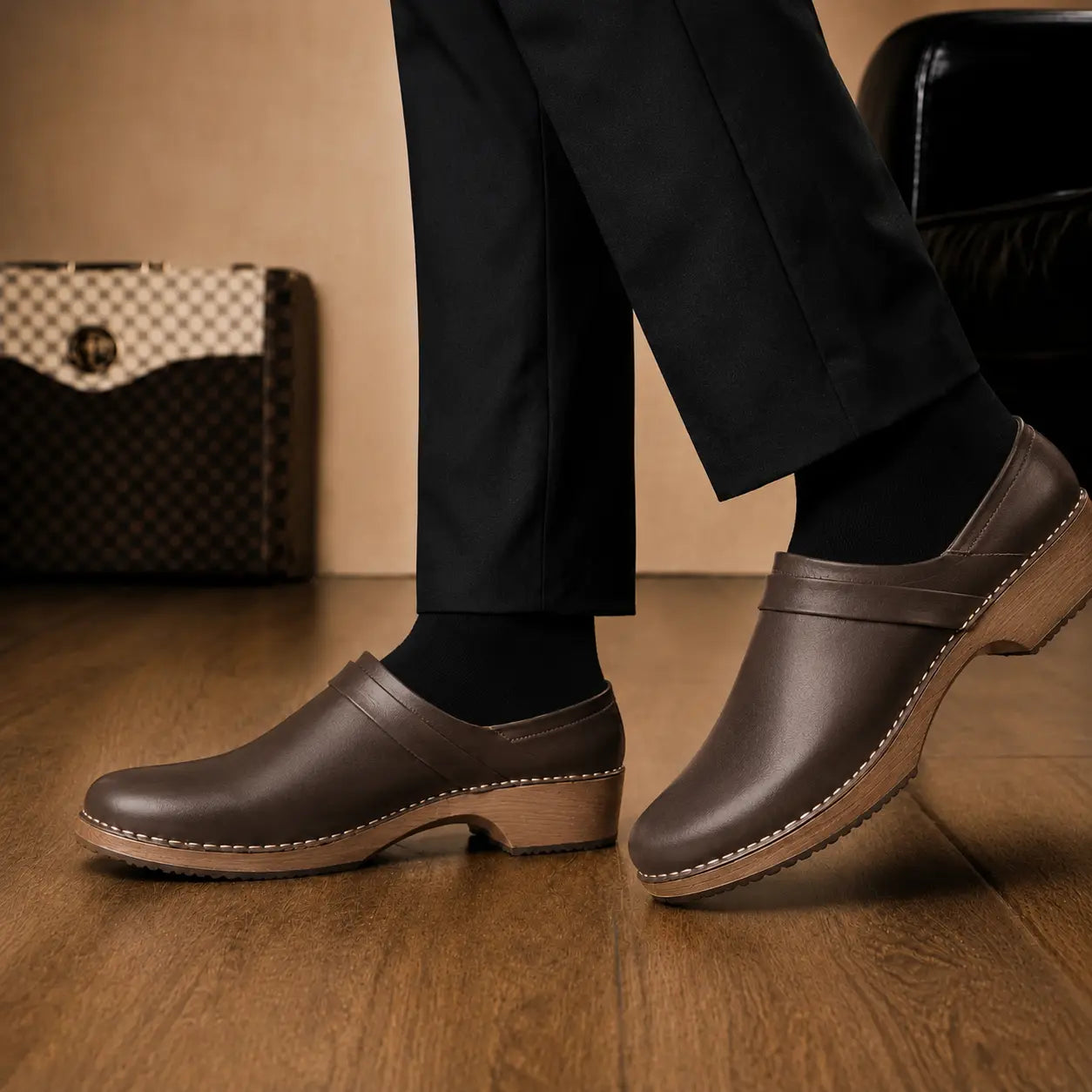 Melodiapelle Madison Mule in dark brown leather worn with formal trousers, on-feet shot