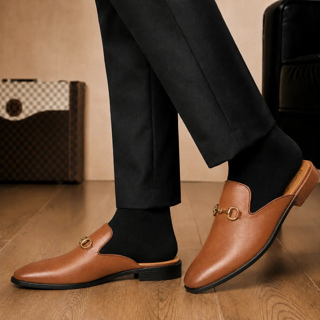 Melodiapelle Madison Mule in tan leather worn with formal trousers, on-feet shot