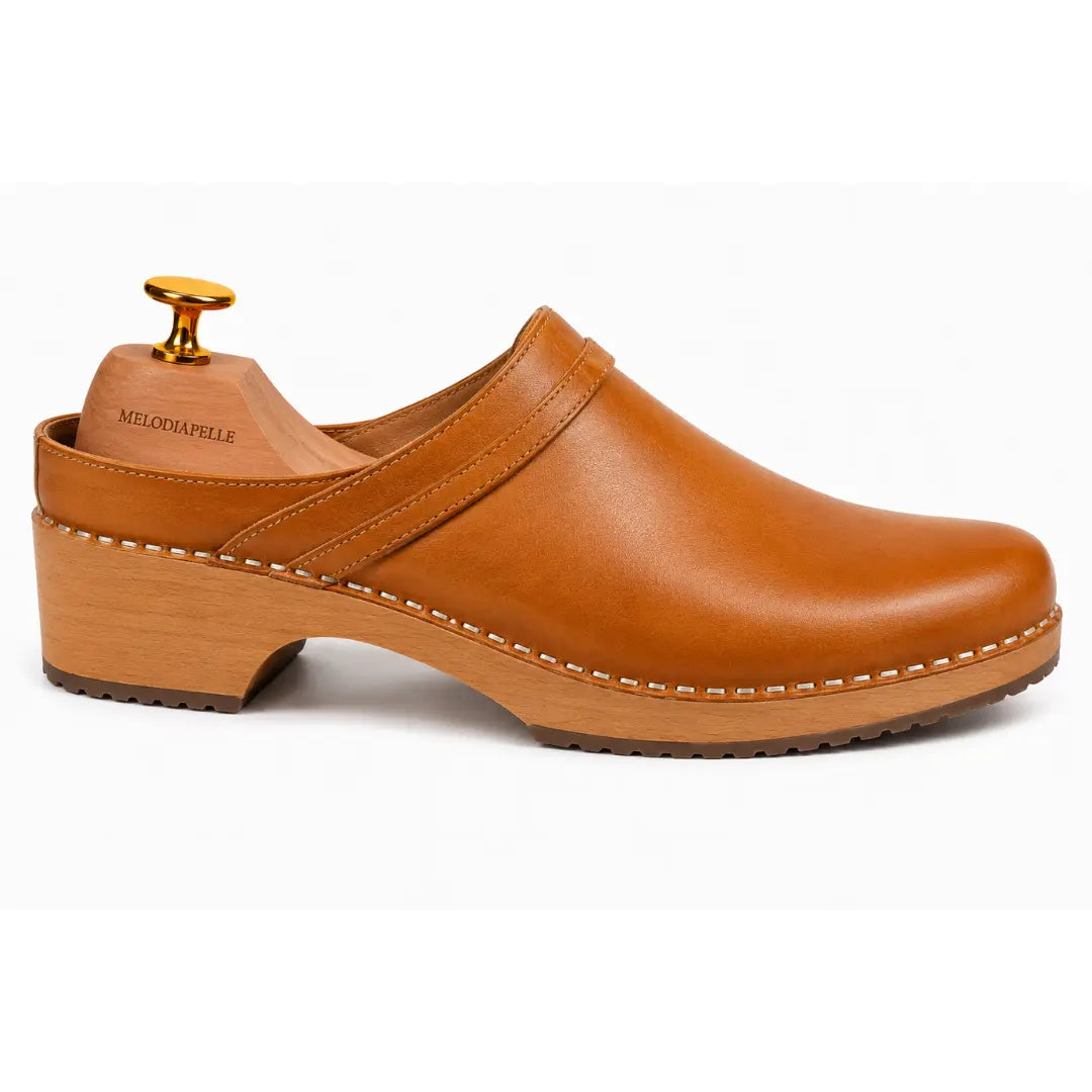 Side profile of the Madison Mule in tan leather on white background