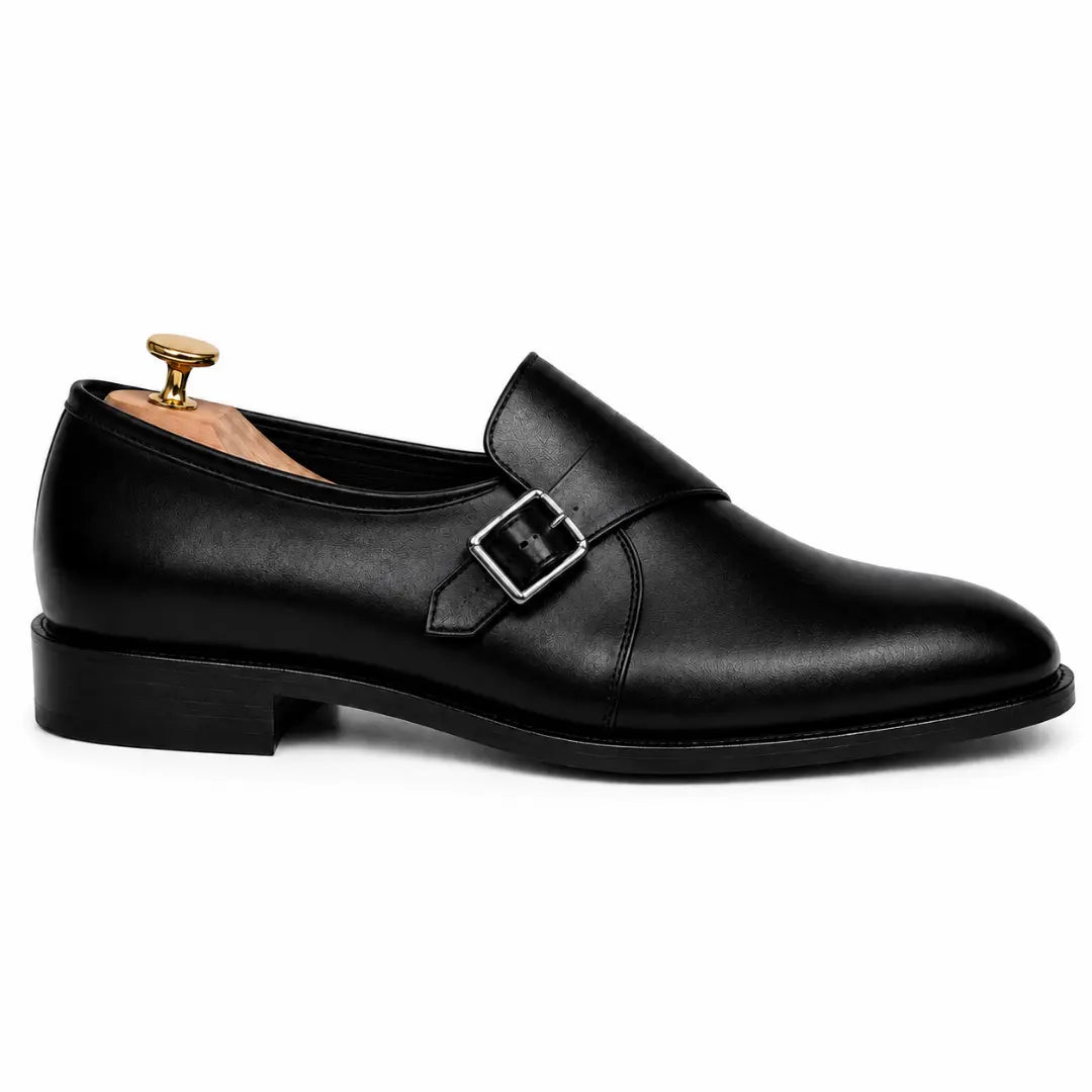 Side profile of the Madrid Single Monk Strap in black leather on white background