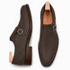 Dark chocolate leather single monk strap shoe, three-quarter angle showing buckle and heel