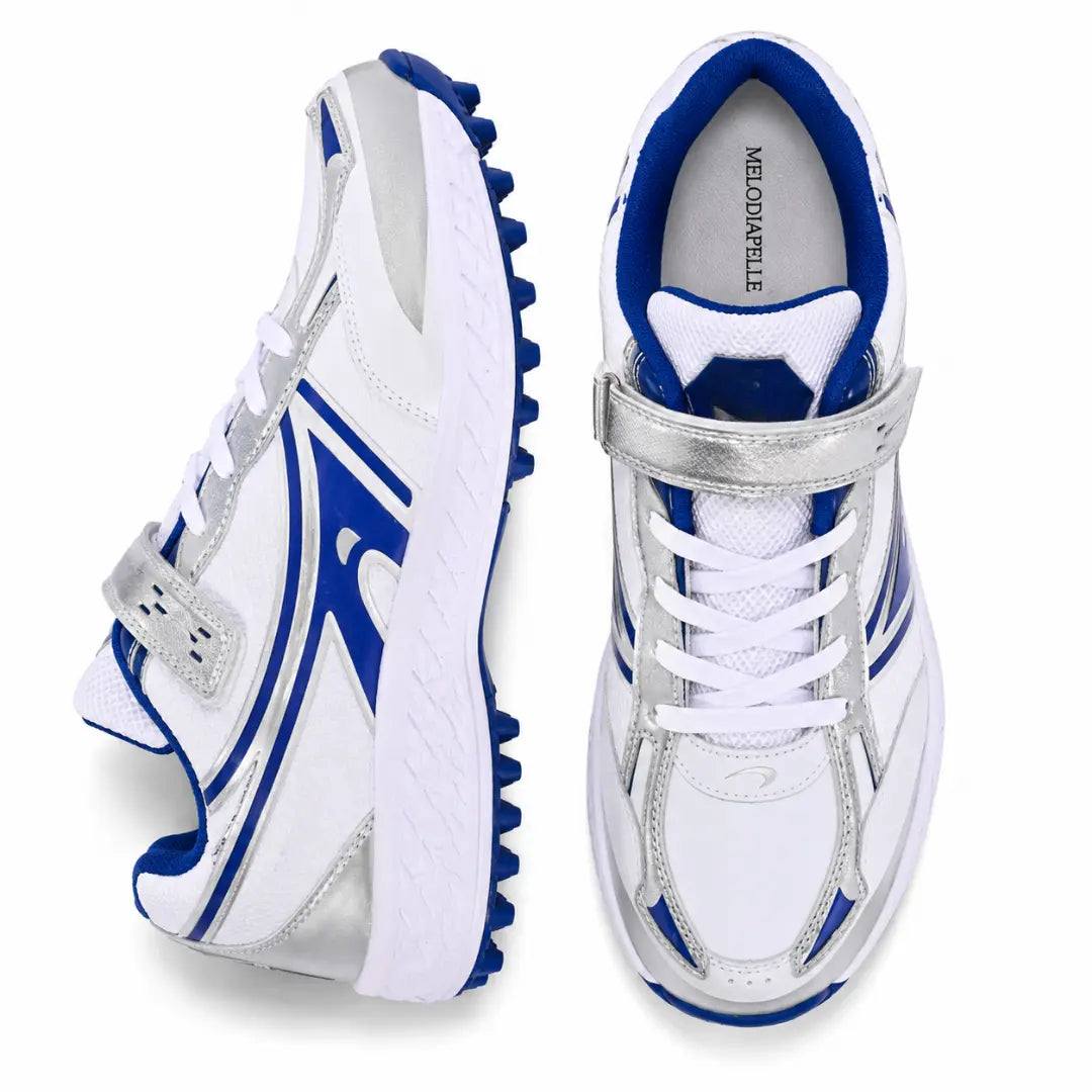 White and royal blue cricket shoe, three-quarter angle showing heel and sole detailing
