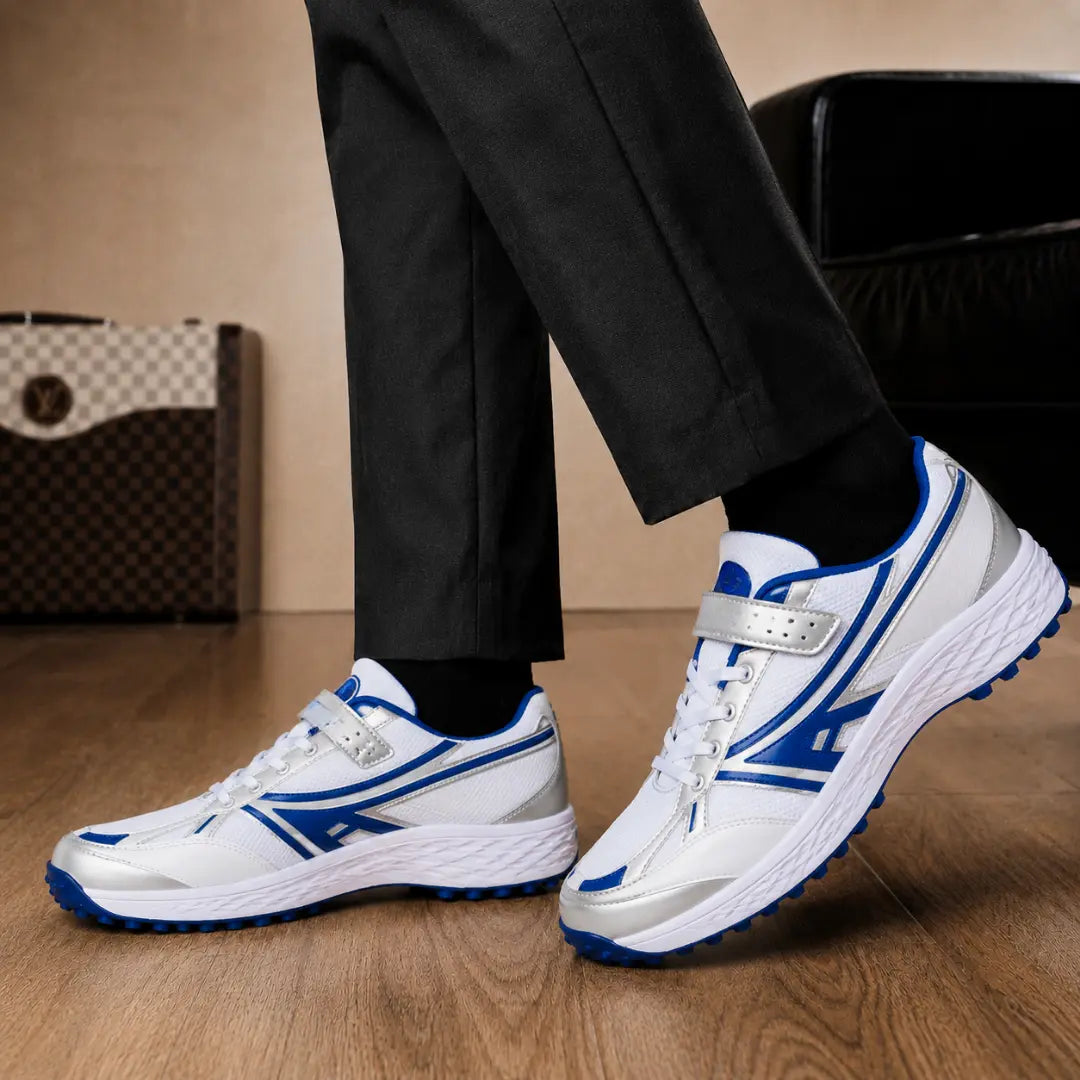 Melodiapelle Maduro Cricket Shoe in white and royal blue worn with trousers, on-feet shot