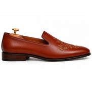 Side profile of the Maestro Embroidered Opera Loafer in cognac tan leather on white background