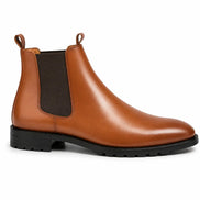Side profile of the Magna Chelsea Boot in tan leather on white background