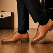 Melodiapelle Magnum Derby Shoe in tan leather worn with formal trousers, on-feet shot