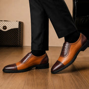 Melodiapelle Maiden Oxford Shoes in tan and dark brown leather worn with formal trousers, on-feet shot