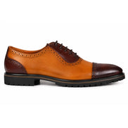 Side profile of the Maiden Oxford Shoes in tan and dark brown leather on white background