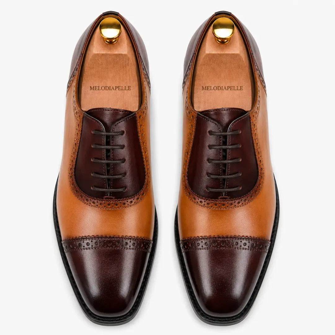 Melodiapelle Maiden Oxford Shoes in tan and dark brown leather, pair top-down view, handcrafted in Agra