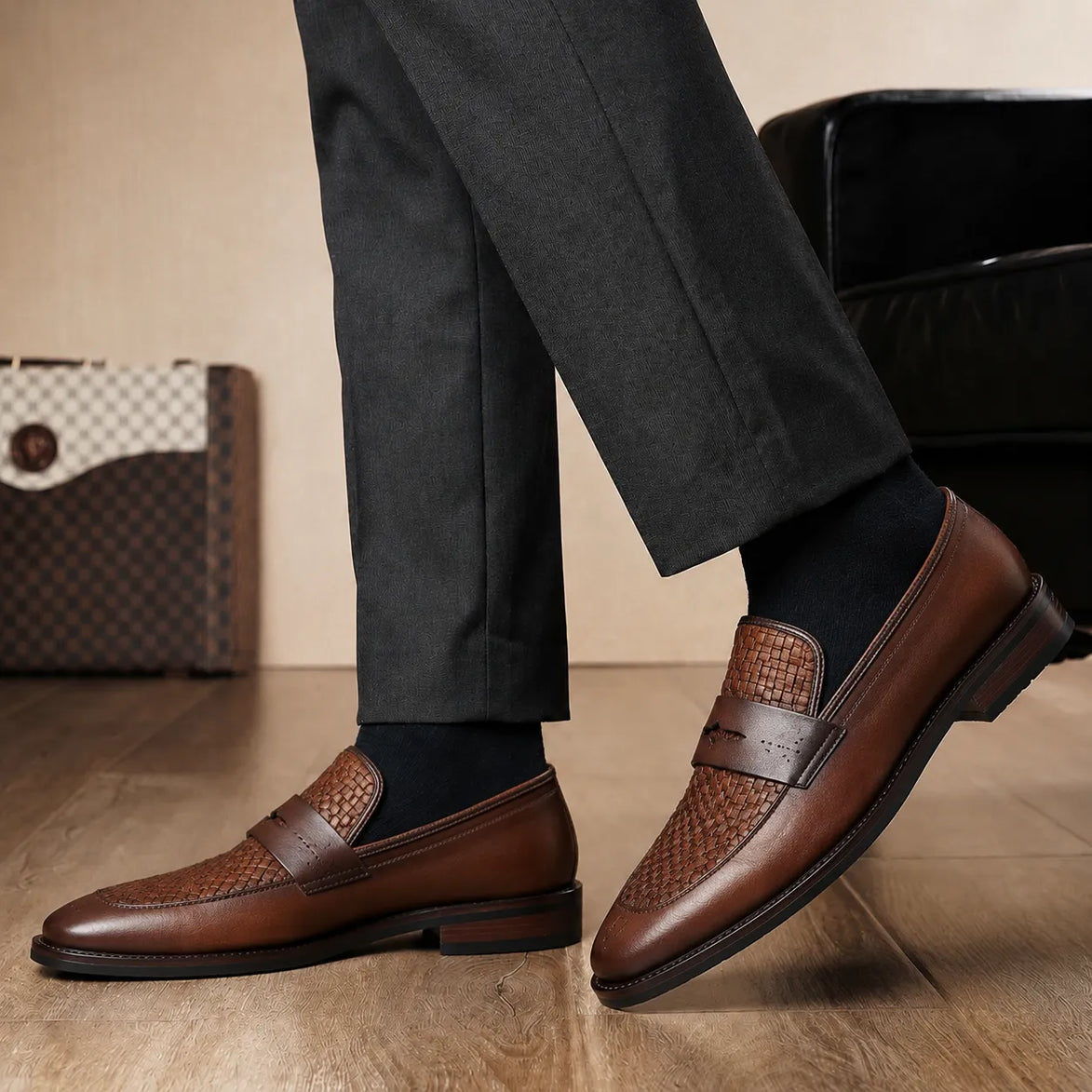 Melodiapelle Maison Woven Penny Loafer in cognac tan leather worn with formal trousers, on-feet shot