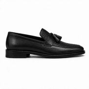 Side profile of the Maison Woven Two-Tone Penny Loafer in black leather on white background