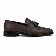 Side profile of the Maison Woven Two-Tone Penny Loafer in brown leather on white background