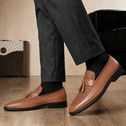 Melodiapelle Maison Woven Two-Tone Penny Loafer in tan leather worn with formal trousers, on-feet shot
