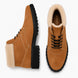 Camel suede shearling-lined winter boot, three-quarter angle showing heel and sole detailing