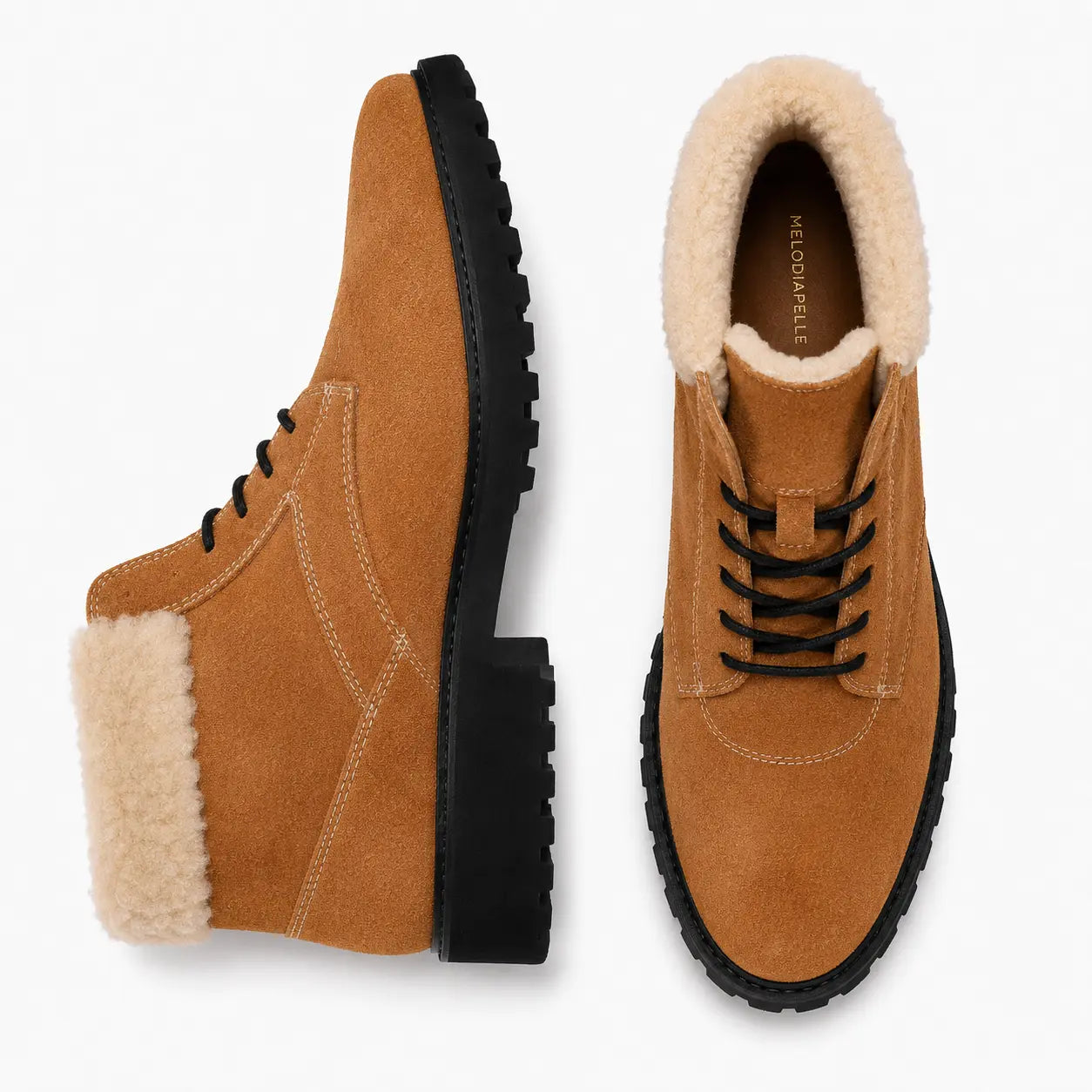 Camel suede shearling-lined winter boot, three-quarter angle showing heel and sole detailing