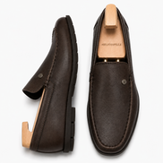 Dark chocolate leather driving loafer, three-quarter angle showing heel and slip-on silhouette