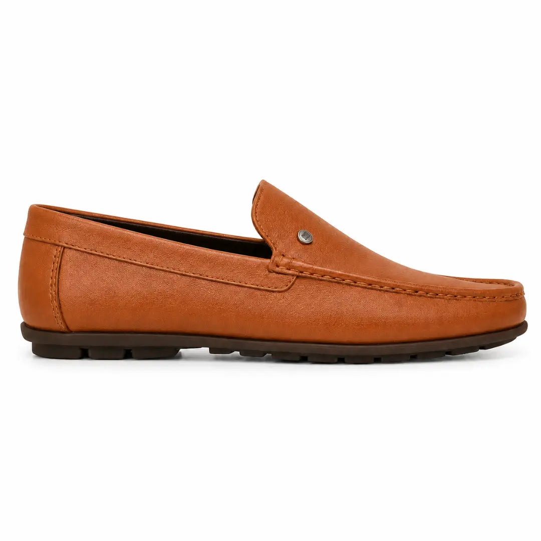 Side profile of the Malaga Driving Loafer in tan leather on white background