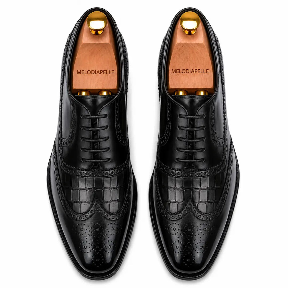 Melodiapelle Malcomb Croc-Panel Wingtip Derby in black leather, pair top-down view, handcrafted in Agra
