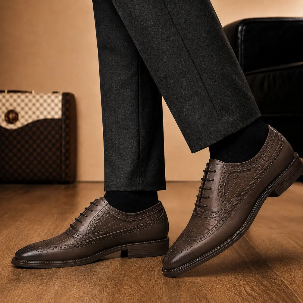 Melodiapelle Malcomb Croc-Panel Wingtip Derby in brown leather worn with formal trousers, on-feet shot