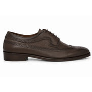 Side profile of the Malcomb Croc-Panel Wingtip Derby in brown leather on white background