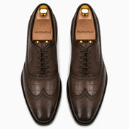 Melodiapelle Malcomb Croc-Panel Wingtip Derby in brown leather, pair top-down view, handcrafted in Agra