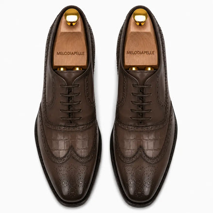 Melodiapelle Malcomb Croc-Panel Wingtip Derby in brown leather, pair top-down view, handcrafted in Agra