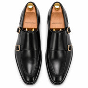 Melodiapelle Malibu Apron Monk Strap in nero black leather, pair top-down view, handcrafted in Agra