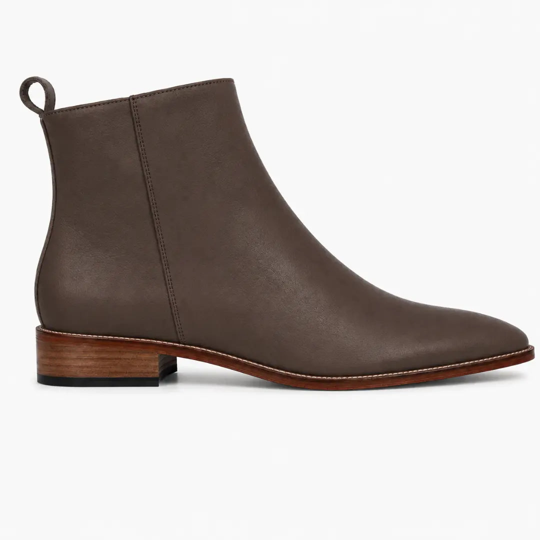 Side profile of the Malone Zip Ankle Boot in dark brown leather on white background