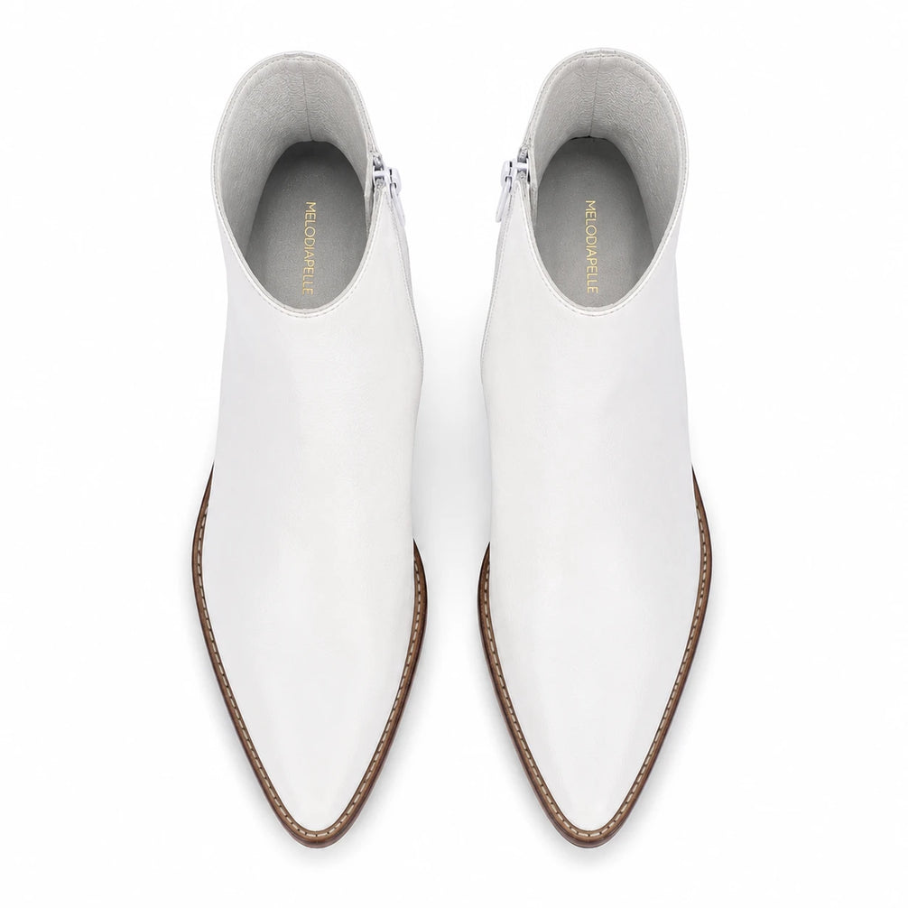 Melodiapelle Malone Zip Ankle Boot in pearl white leather, pair top-down view, handcrafted in Agra