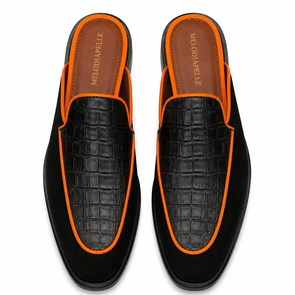 Melodiapelle Malta Mule in black croc-embossed leather with orange piping, pair top-down view, handcrafted in Agra