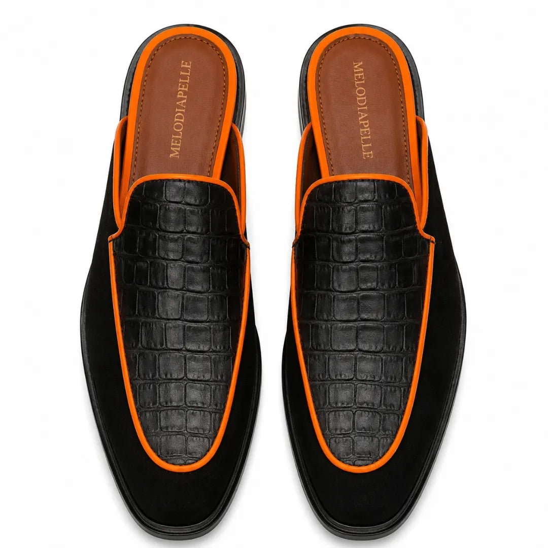 Melodiapelle Malta Mule in black croc-embossed leather with orange piping, pair top-down view, handcrafted in Agra