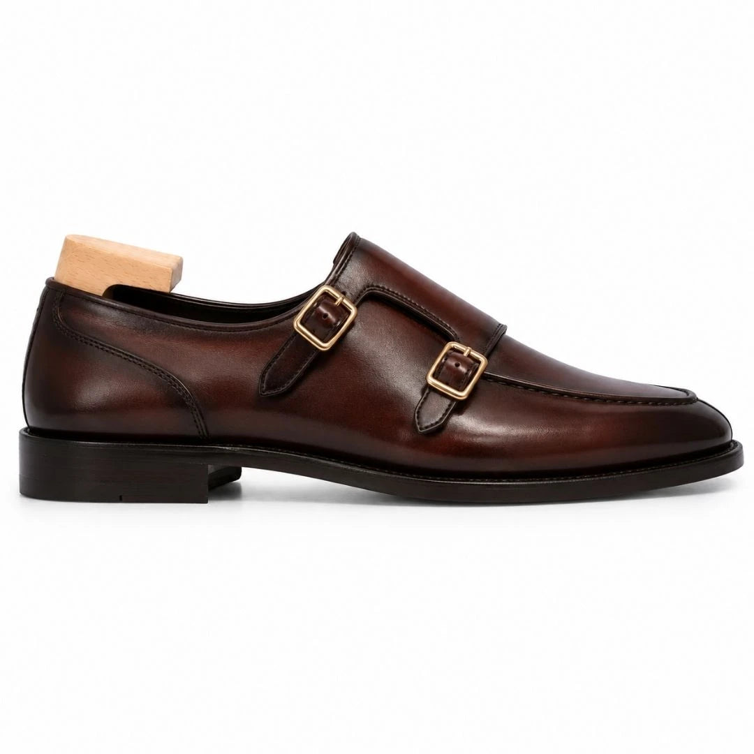 Side profile of the Malvern Apron Monk Strap in dark mahogany leather on white background