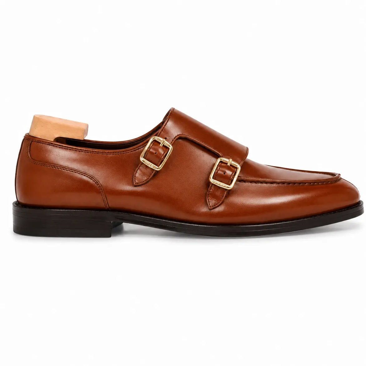 Side profile of the Malvern Apron Monk Strap in tan leather on white background