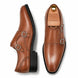 Tan leather double monk strap shoe, three-quarter angle showing buckles and heel