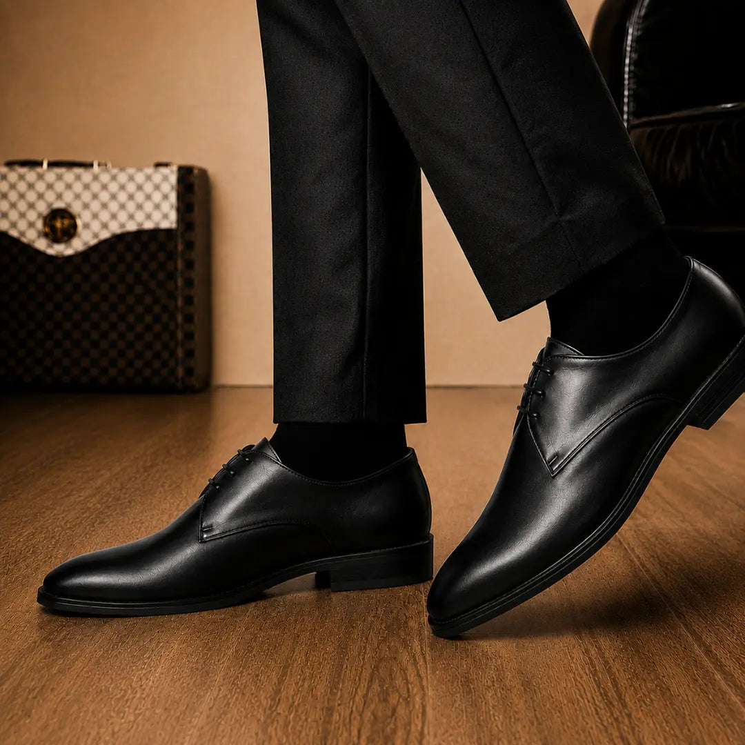 Melodiapelle Mangrove Plain Derby in black leather worn with formal trousers, on-feet shot
